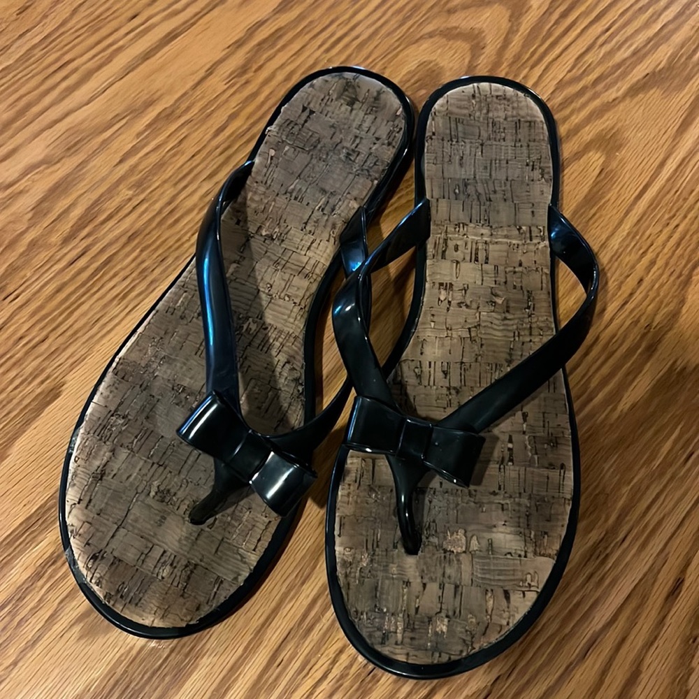 Black bow flip flops